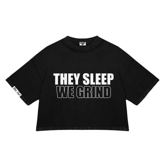 A premium short-sleeve tee from Nite Owl's Fall/Winter Season 01 collection, featuring the bold slogan 'They Sleep We Grind.' Made with soft, breathable cotton in a classic fit, this shirt is designed for comfort, durability, and style. Perfect for hustlers who work hard day and night, it pairs effortlessly with jeans, joggers, or jackets, making it a standout piece for casual or streetwear looks.