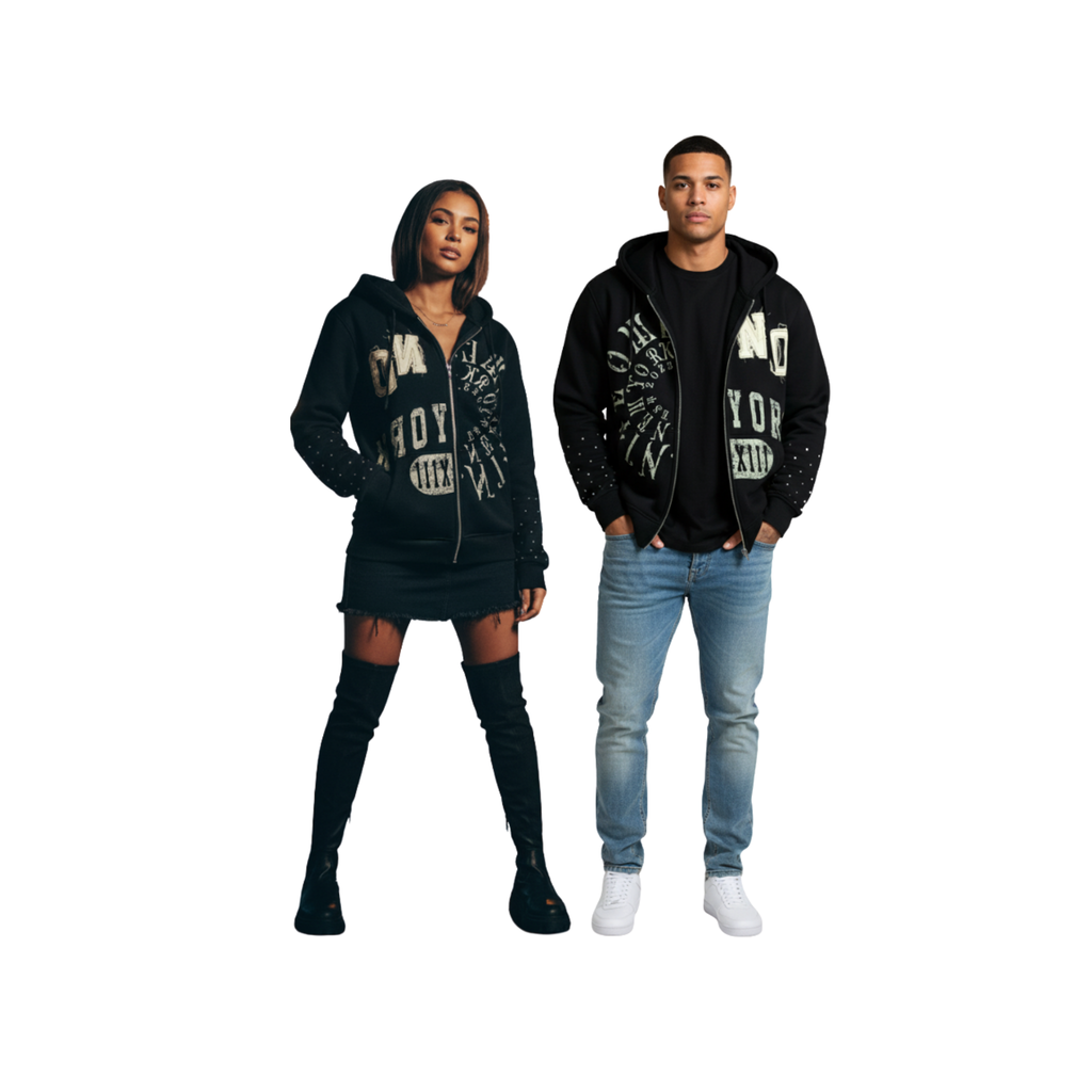“Unisex Nite Owl ‘NO YORK XIII’ Rhinestone Zip Hoodie worn by male and female models standing side-by-side on a white studio background. Premium black streetwear hoodie with gold rhinestone graphics and studded sleeves, styled for both men and women. High-end NYC minimalist luxury loungewear from Nite Owl brand, Fall/Winter streetwear collection.”